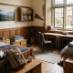 A cozy, traditional boarding school dorm room with two twin beds, wooden desks, and a large window. The contrasting bedding and personal decor highlight the shared living space of two roommates.